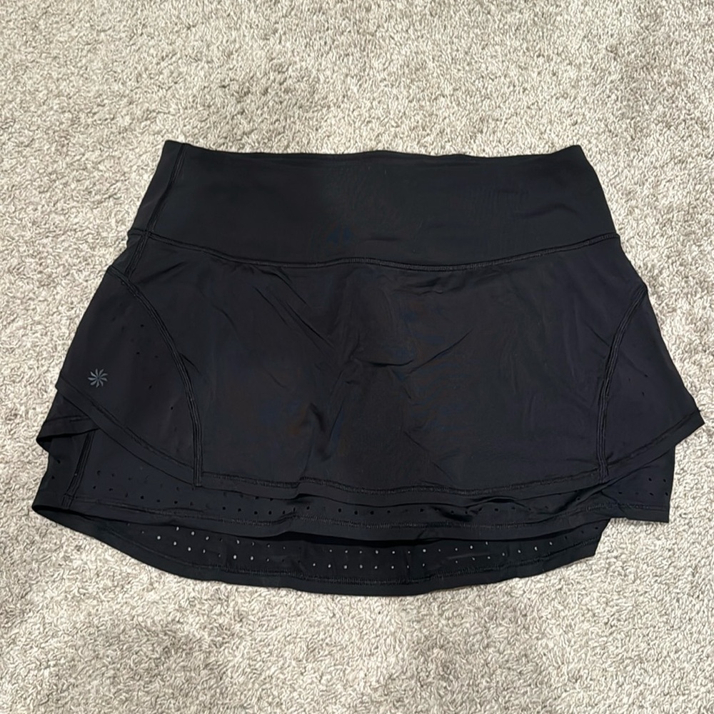 Athleta black skort. Size small. Like new. Pocket on back of waistband.